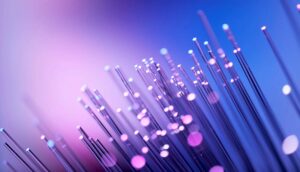 Fiber optics abstract background - Purple Blue Data Internet Technology Cable.