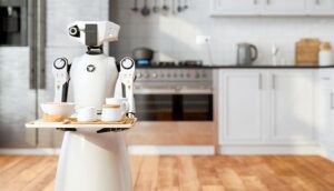 Serving robot holding tray in a kitchen.