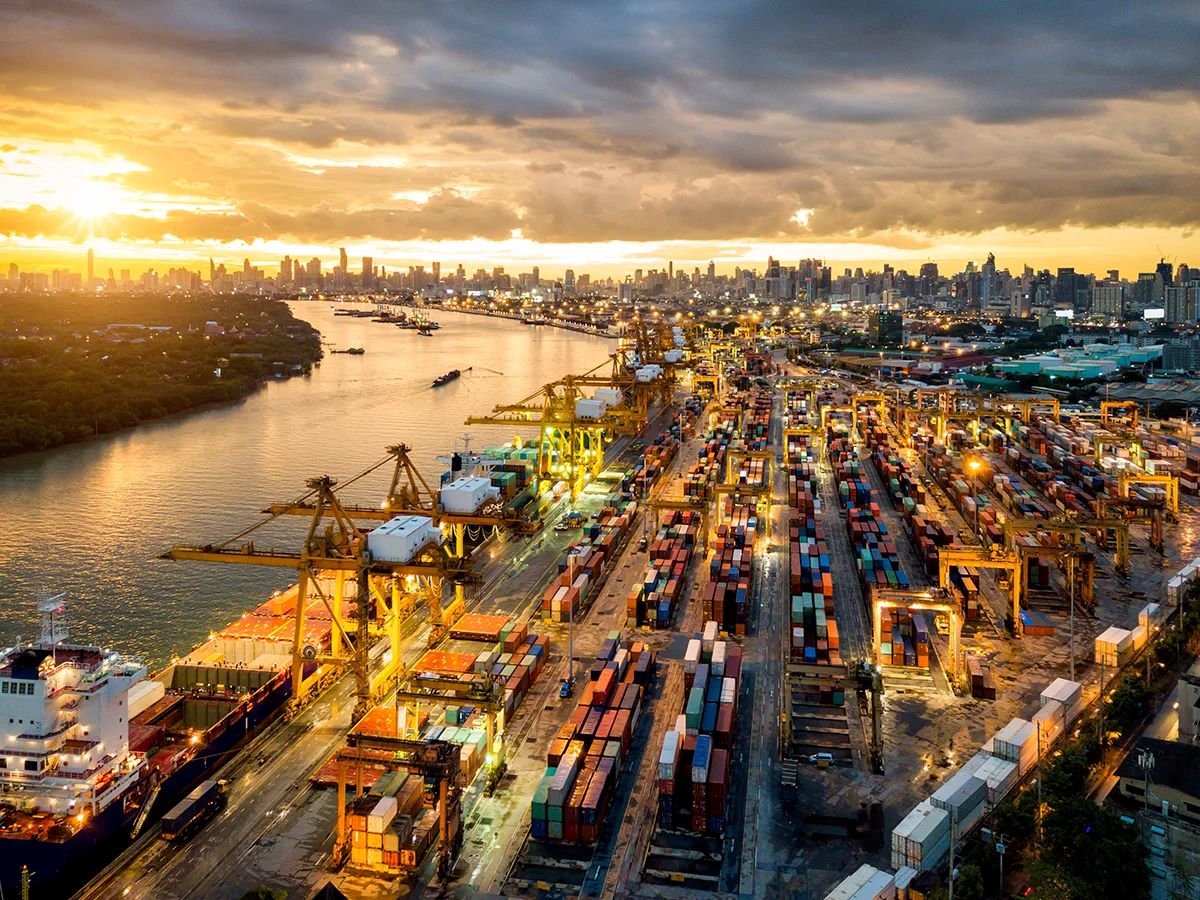 GettyImages-996270738_Aerial-view-of-international-port-with-Crane-loading-containers-CARD_0.jpg